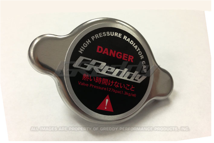 High pressure radiator cap outlet benefits